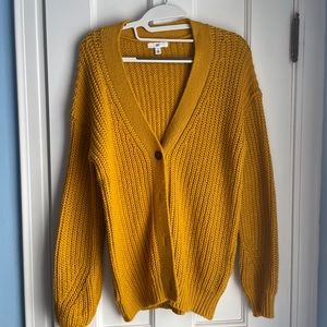 yellow sweater
